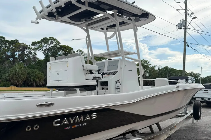 Slide: The Image of 2023 Caymas 26 HB boat with sleek design and advanced navigation equipment. - 5