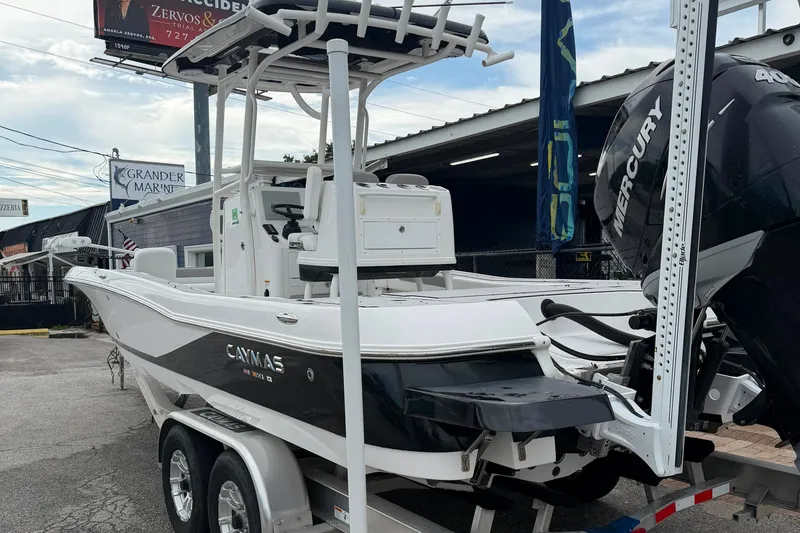 Slide: The Image of 2023 Caymas 26 HB boat with Mercury engine on trailer at Grander Marine. - 2