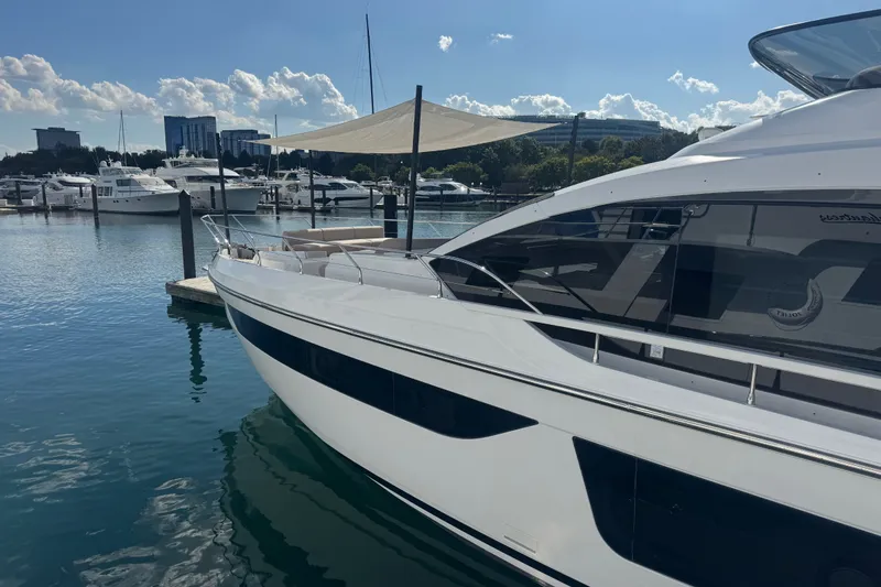 Slide: The Image of Luxury Azimut Fly 68 yacht docked at marina, 2023 model, sunny day. - 179