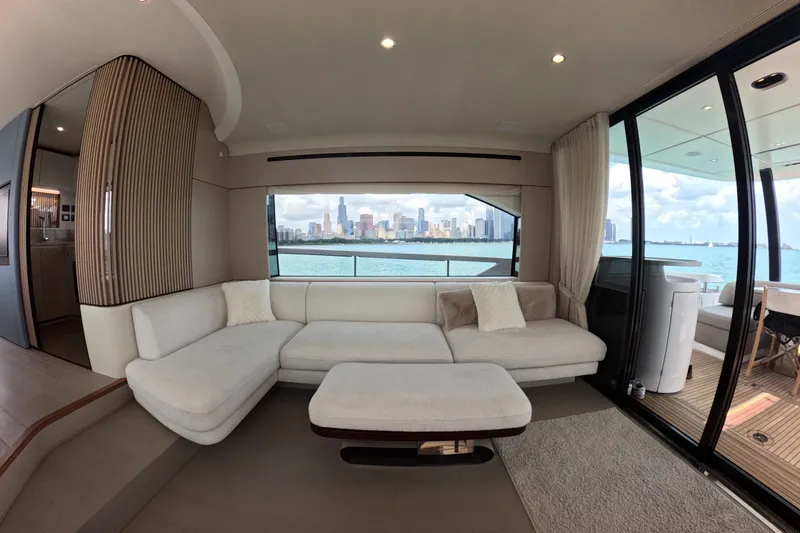 Slide: The Image of Luxurious interior of 2023 Azimut Fly 68 yacht with city skyline view. - 44