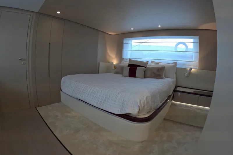 Slide: The Image of Luxurious bedroom interior of 2023 Azimut Fly 68 yacht with modern design and cozy ambiance. - 89