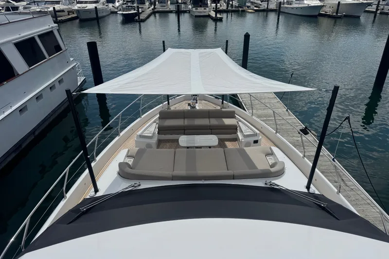 Slide: The Image of Luxurious 2023 Azimut Fly 68 yacht with shaded deck at marina. - 159