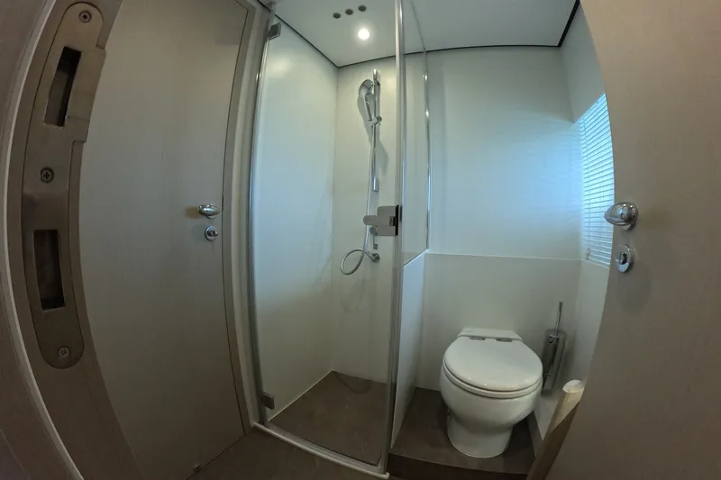 Slide: The Image of Modern bathroom in 2023 Azimut Fly 68 yacht with shower and toilet. - 102