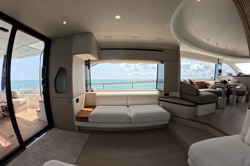Slide: The Image of Luxurious interior of 2023 Azimut Fly 68 yacht with ocean view and elegant seating. - 48