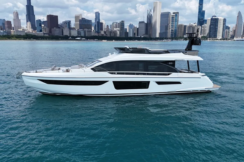 Slide: The Image of 2023 Azimut Fly 68 yacht cruising near city skyline on a clear day. - 14
