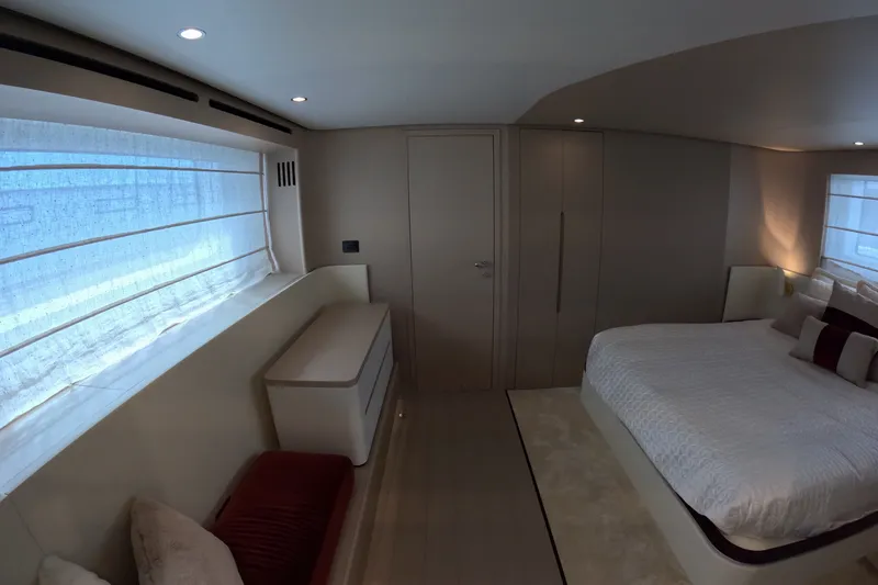 Slide: The Image of Luxurious bedroom interior of 2023 Azimut Fly 68 yacht with modern design and cozy ambiance. - 86