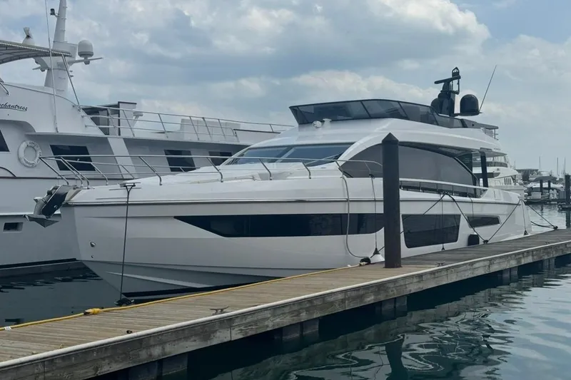 Slide: The Image of 2023 Azimut Fly 68 yacht docked at marina, sleek design, calm waters. - 118