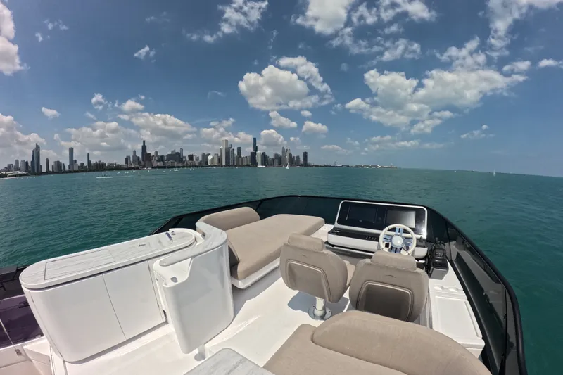 Slide: The Image of 2023 Azimut Fly 68 yacht with city skyline and ocean view. - 35