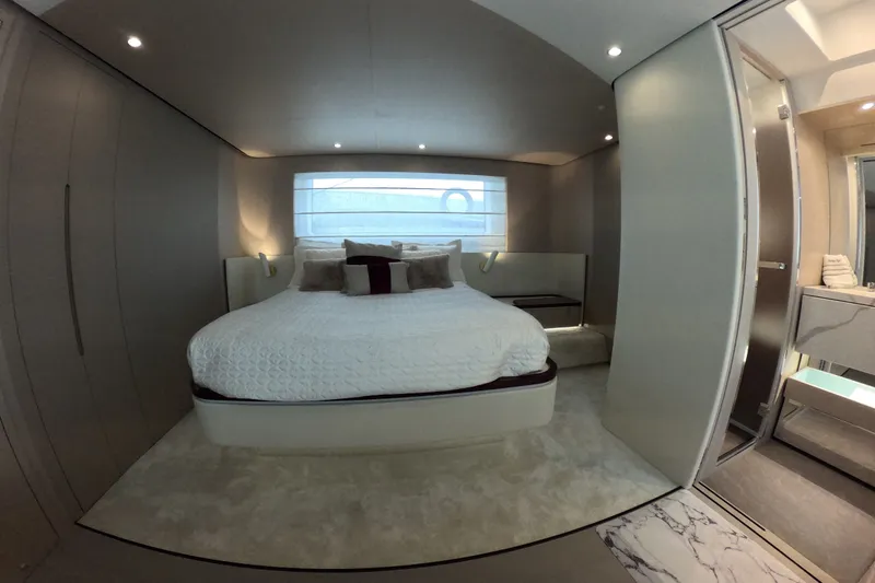Slide: The Image of Luxurious bedroom interior of 2023 Azimut Fly 68 yacht, featuring modern design and elegant furnishings. - 104
