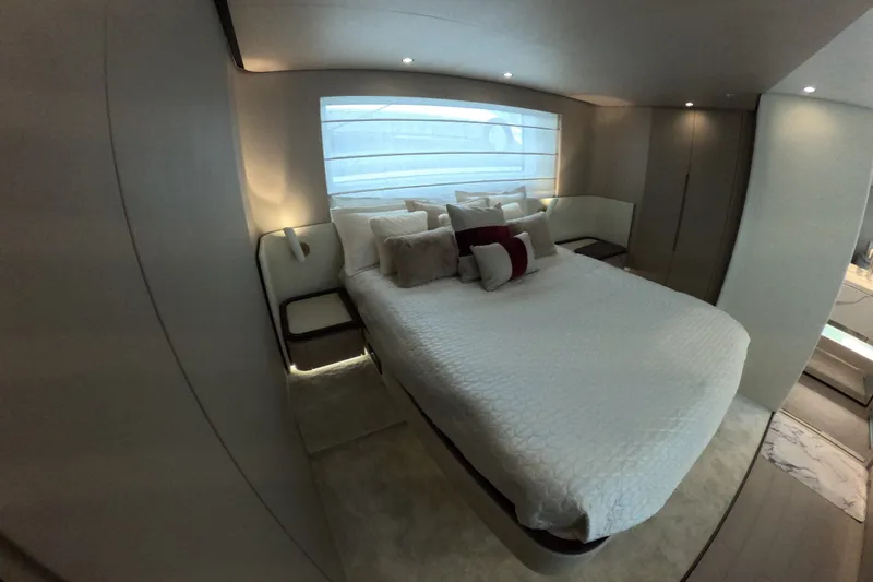 Slide: The Image of Luxurious bedroom interior of 2023 Azimut Fly 68 yacht with modern design and elegant bedding. - 103
