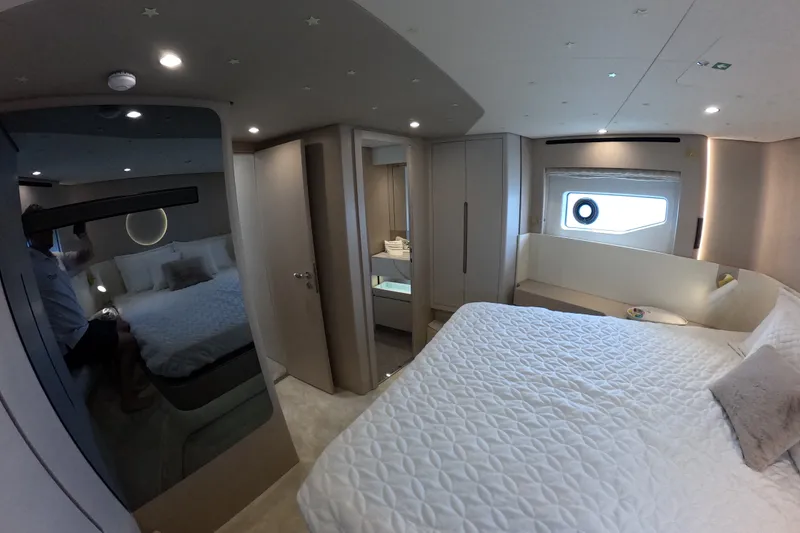 Slide: The Image of Luxurious bedroom interior of 2023 Azimut Fly 68 yacht with modern design and cozy ambiance. - 109