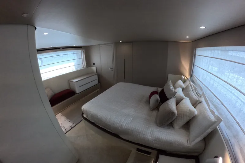 Slide: The Image of Luxurious bedroom interior of 2023 Azimut Fly 68 yacht with elegant bedding and modern design. - 98