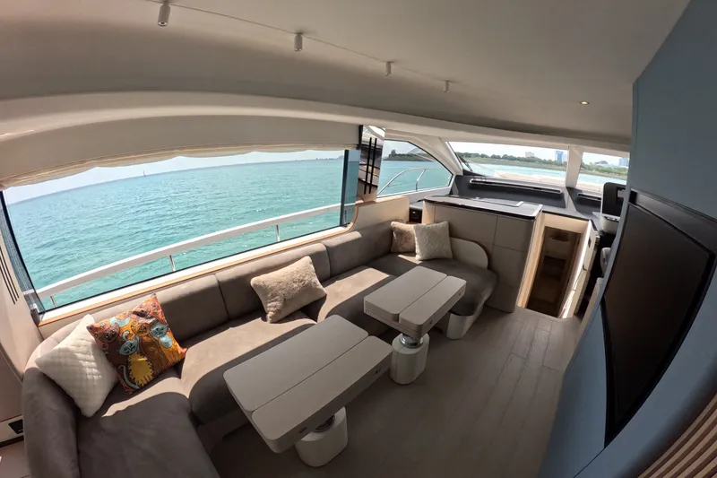 Slide: The Image of Luxurious interior of 2023 Azimut Fly 68 yacht with ocean view and modern seating. - 55