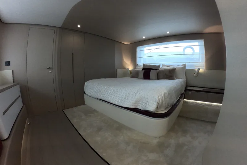 Slide: The Image of Luxurious bedroom interior of 2023 Azimut Fly 68 yacht, featuring elegant design and modern amenities. - 105