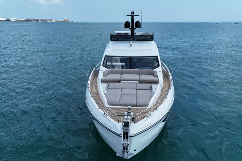 Slide: The Image of 2023 Azimut Fly 68 yacht cruising on open water, showcasing luxury design. - 11