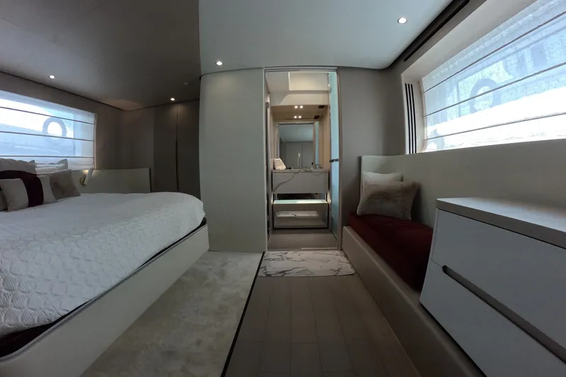 Slide: The Image of Luxurious bedroom interior of 2023 Azimut Fly 68 yacht with modern design and elegant furnishings. - 94