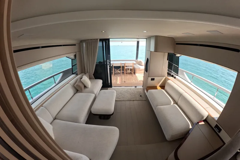 Slide: The Image of Luxurious interior of 2023 Azimut Fly 68 yacht with ocean view and elegant seating. - 45
