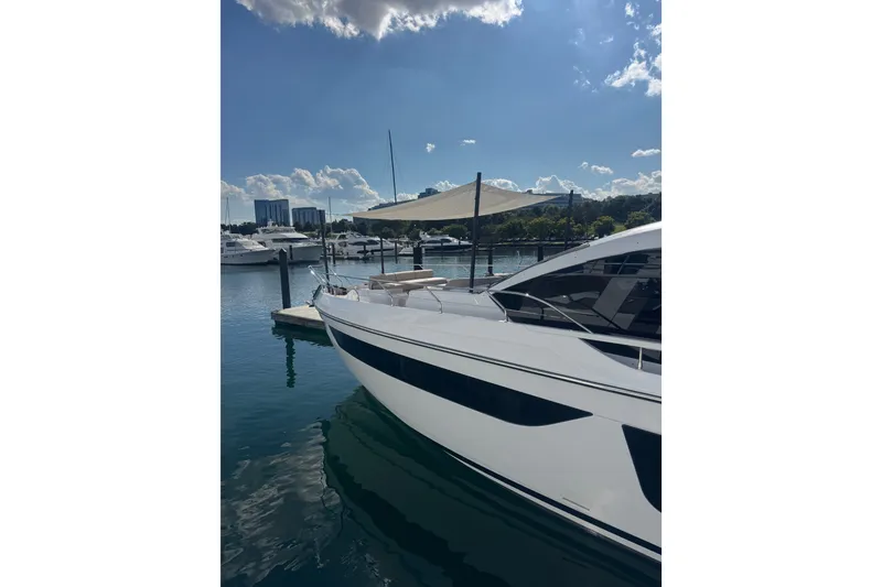 Slide: The Image of Azimut Fly 68 yacht docked in sunny marina, 2023 model. - 177