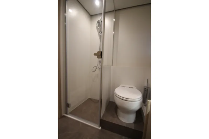 Slide: The Image of Modern bathroom in 2023 Azimut Fly 68 yacht with shower and toilet. - 101