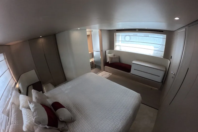 Slide: The Image of Luxurious bedroom interior of 2023 Azimut Fly 68 yacht with modern design and elegant furnishings. - 97