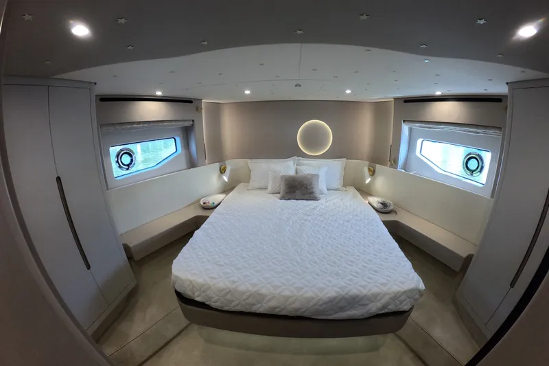 Slide: The Image of Luxurious bedroom interior of 2023 Azimut Fly 68 yacht with modern design and ambient lighting. - 105