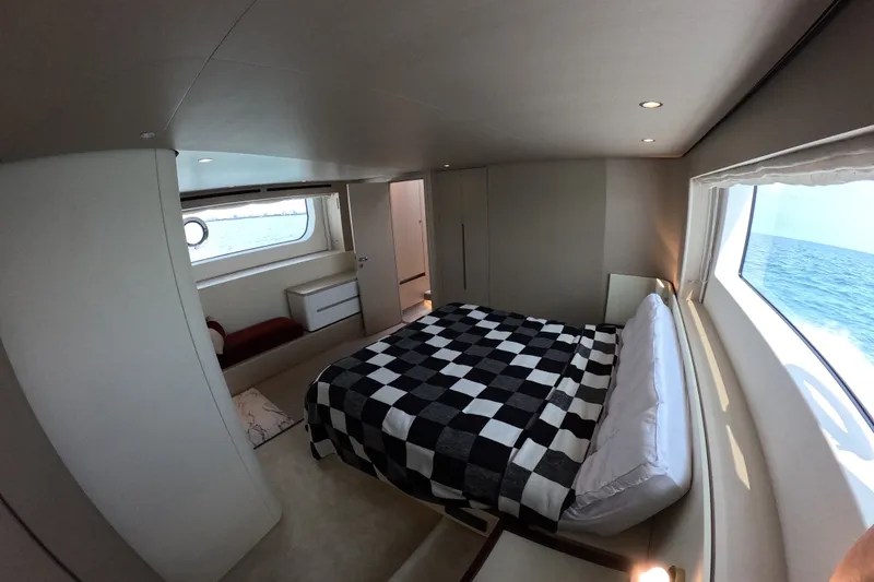 Slide: The Image of Luxurious bedroom interior of 2023 Azimut Fly 68 yacht with ocean view. - 79