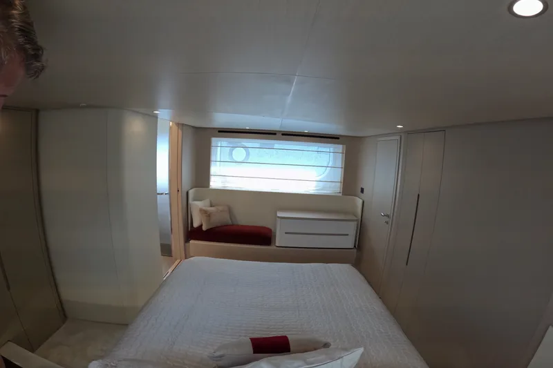 Slide: The Image of Luxurious bedroom interior of 2023 Azimut Fly 68 yacht, featuring modern design and elegant furnishings. - 85
