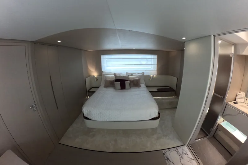 Slide: The Image of Luxurious bedroom interior of 2023 Azimut Fly 68 yacht, featuring modern design and elegant furnishings. - 92