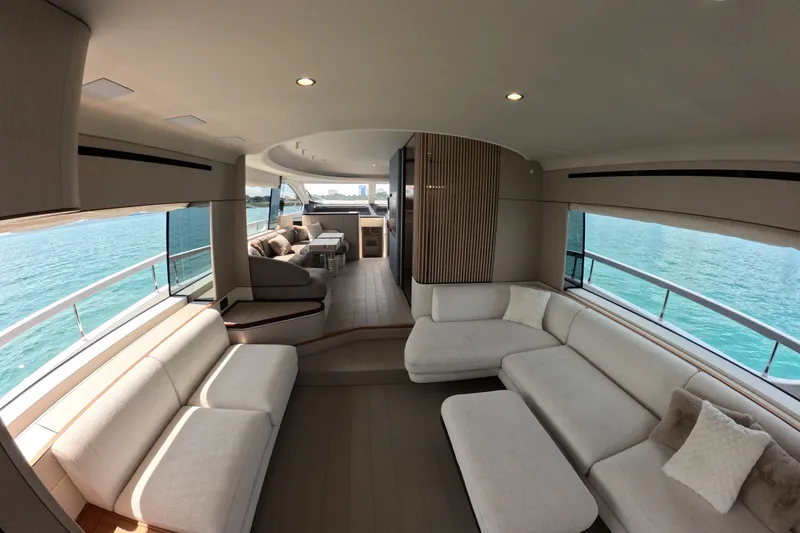 Slide: The Image of Luxurious interior of 2023 Azimut Fly 68 yacht with elegant seating and panoramic ocean views. - 41