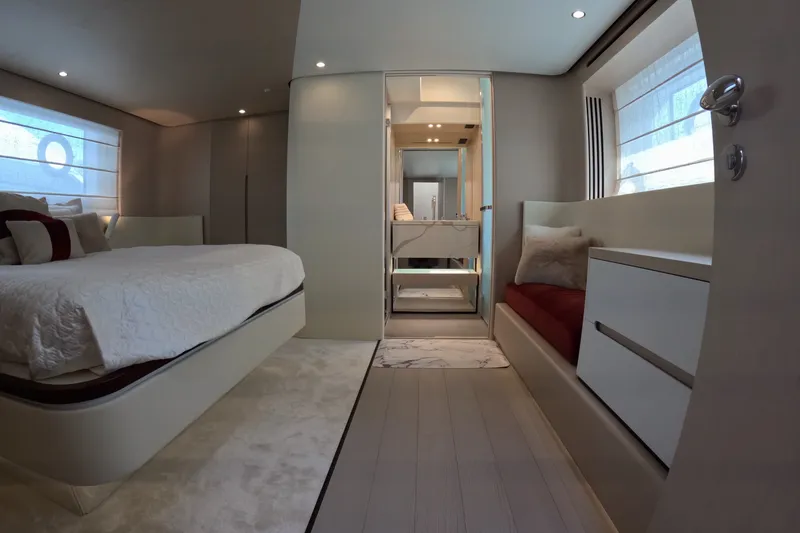 Slide: The Image of Luxurious interior of 2023 Azimut Fly 68 yacht bedroom with modern design and elegant furnishings. - 77