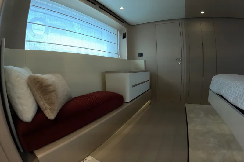 Slide: The Image of Luxurious interior of 2023 Azimut Fly 68 yacht with modern seating and elegant decor. - 88