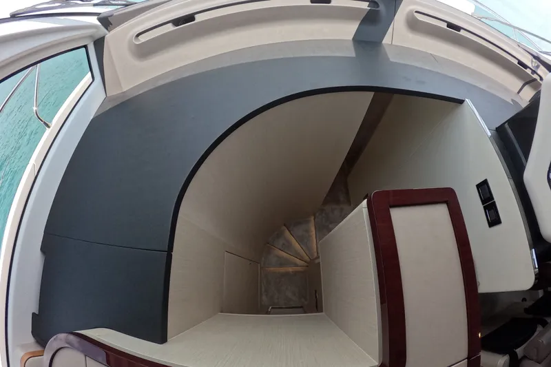 Slide: The Image of Interior staircase of 2023 Azimut Fly 68 yacht, featuring modern design and elegant finishes. - 69