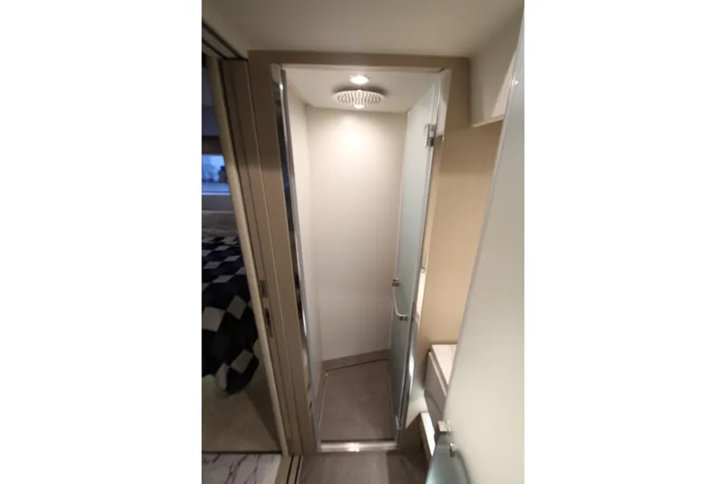 Slide: The Image of Interior of 2023 Azimut Fly 68 yacht, featuring a modern shower area. - 90