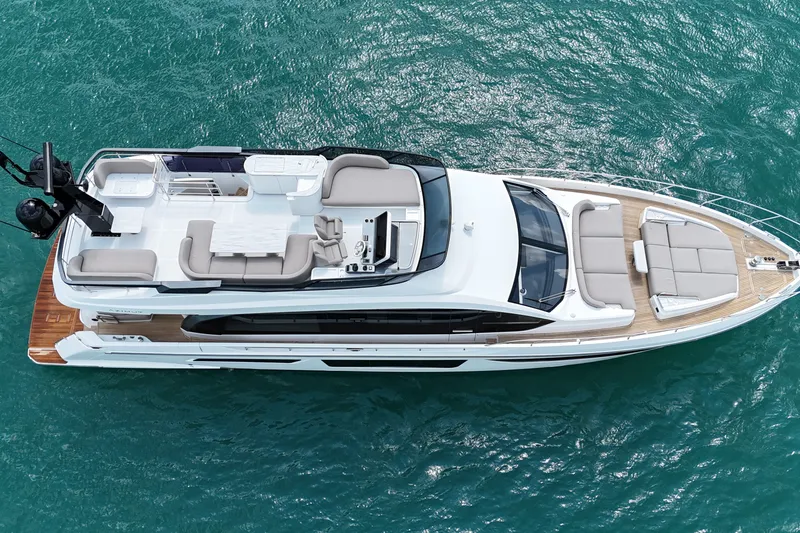 Slide: The Image of Aerial view of 2023 Azimut Fly 68 yacht on turquoise water. - 8