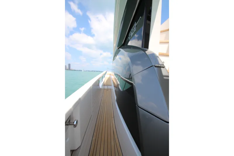 Slide: The Image of 2023 Azimut Fly 68 yacht deck with sleek design and ocean view. - 24