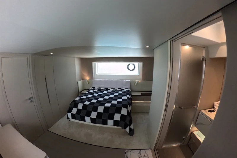 Slide: The Image of Luxurious bedroom interior of 2023 Azimut Fly 68 yacht with modern design and ensuite bathroom. - 84