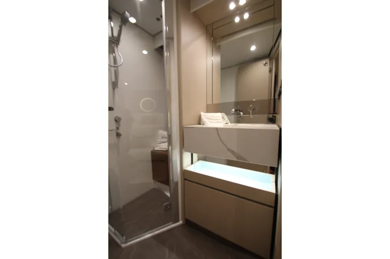 Slide: The Image of Luxurious bathroom in 2023 Azimut Fly 68 yacht with modern fixtures and elegant design. - 113