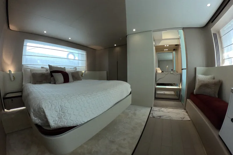 Slide: The Image of Luxurious bedroom interior of 2023 Azimut Fly 68 yacht with modern design and elegant furnishings. - 93