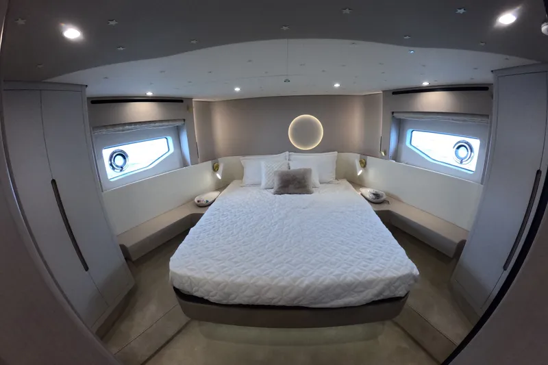 Slide: The Image of Luxurious bedroom interior of 2023 Azimut Fly 68 yacht with modern design and ambient lighting. - 106