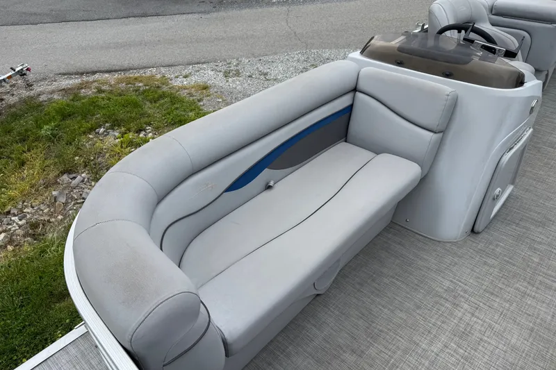 Slide: The Image of 2020 Bennington S 22 SL pontoon boat with gray seating and helm station. - 7