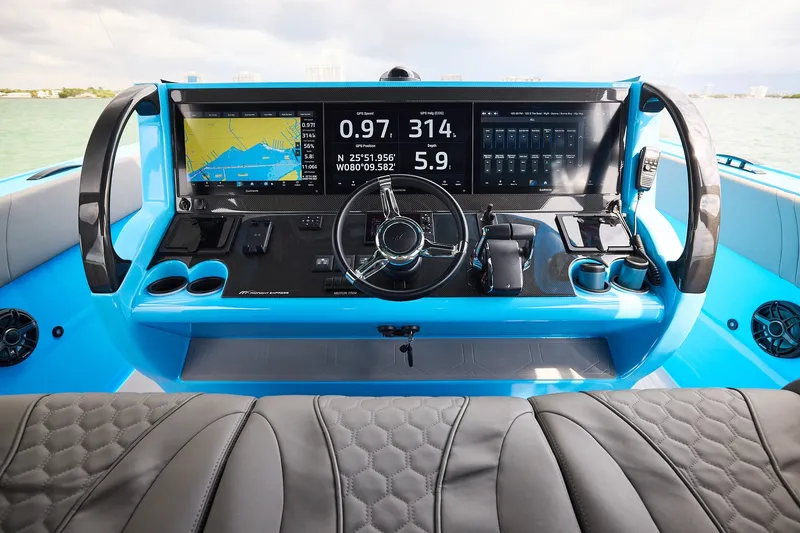 Slide: The Image of Cockpit of Midnight Express 43 Open boat with advanced navigation displays and controls. - 14