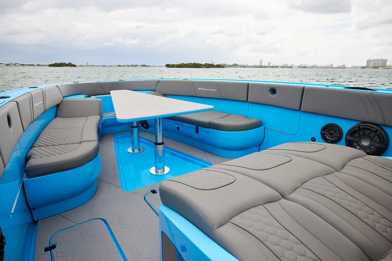 Slide: The Image of Luxurious seating area on a Midnight Express 43 Open boat with ocean view. - 12