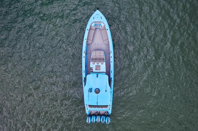 Slide: The Image of Aerial view of Midnight Express 43 Open boat on water. - 5