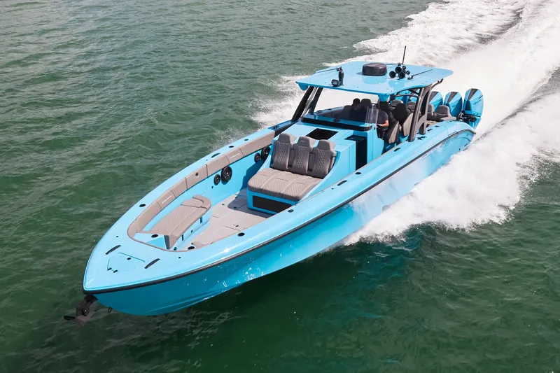Slide: The Image of Blue Midnight Express 43 Open boat cruising swiftly on the water. - 1