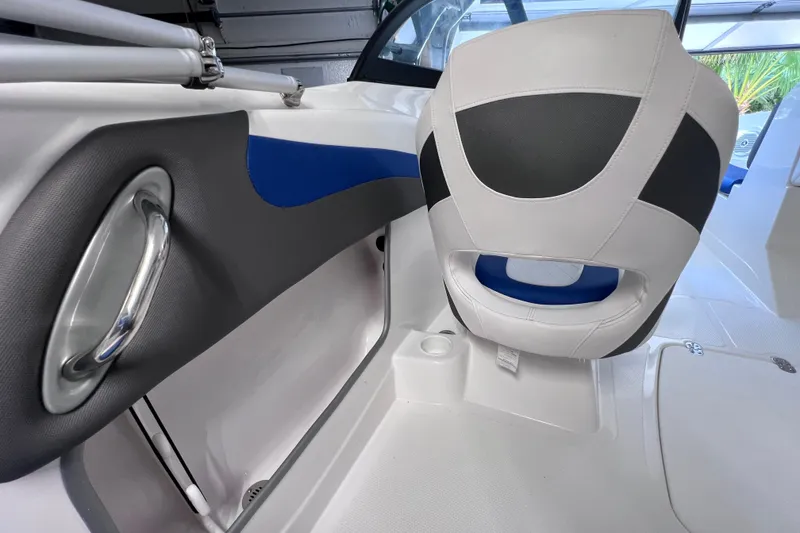 Slide: The Image of 2024 Tahoe 200 S boat interior with modern seating and sleek design elements. - 22
