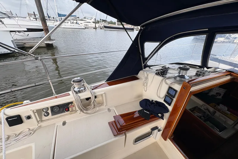 Slide: The Image of Cockpit of a 2002 Caliber 40LRC sailboat docked at a marina. - 46