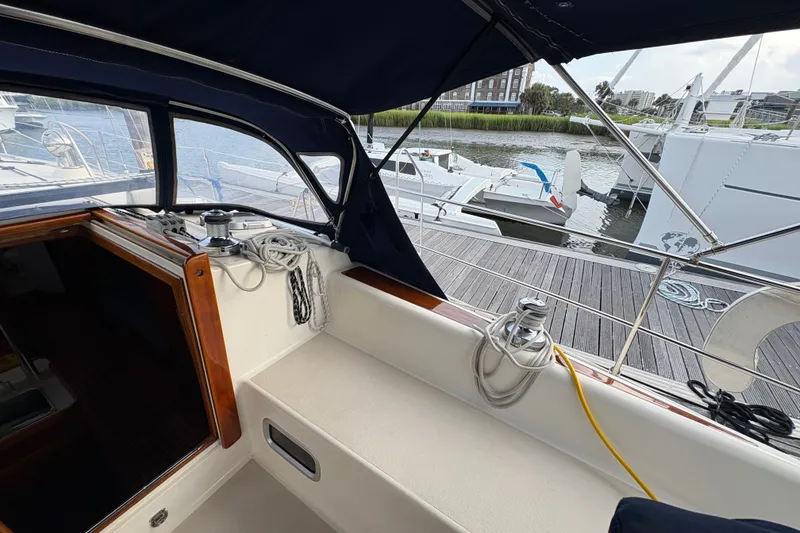 Slide: The Image of Interior view of a 2002 Caliber 40LRC sailboat docked at a marina. - 45