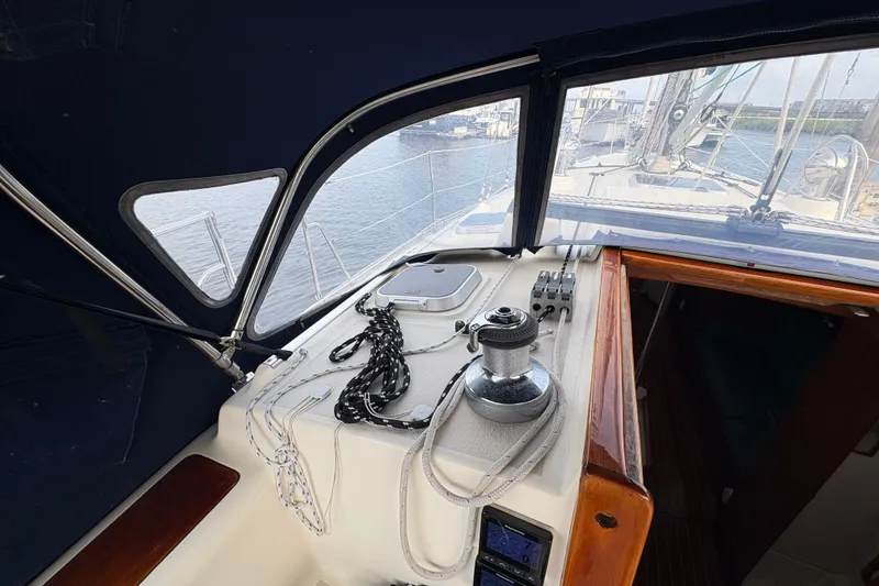 Slide: The Image of Cockpit view of 2002 Caliber 40LRC sailboat with ropes and winch. - 43