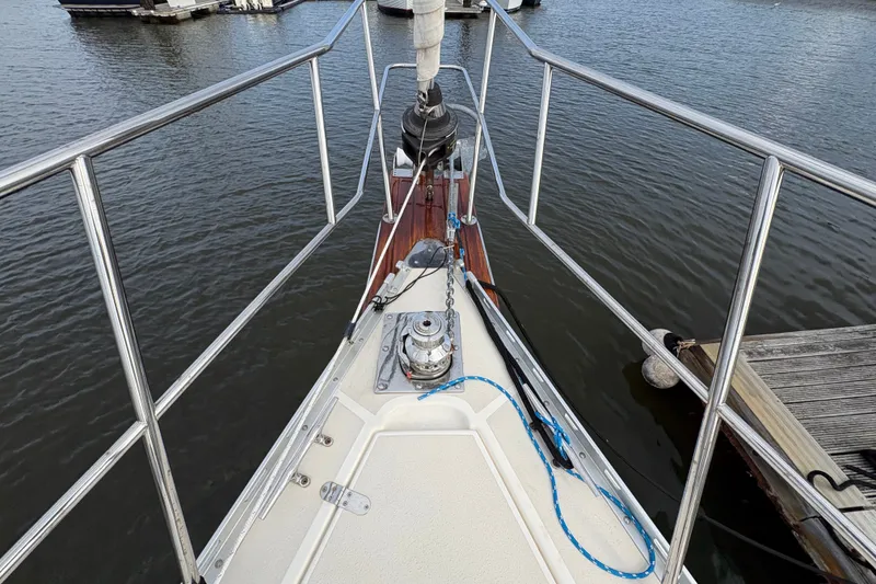 Slide: The Image of Bow view of 2002 Caliber 40LRC sailboat docked at marina. - 10