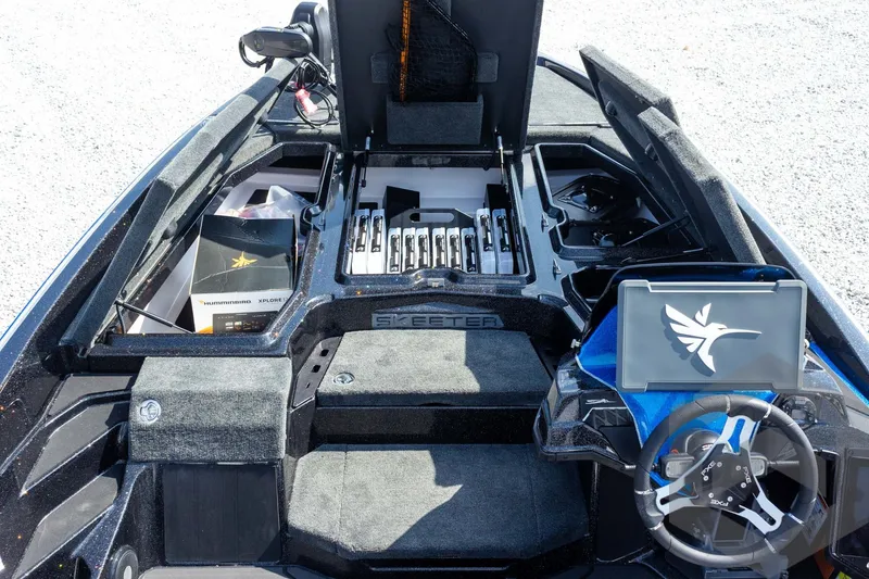 Slide: The Image of 2027 Skeeter FXE20 Pro boat interior with advanced fishing gear and navigation system. - 15